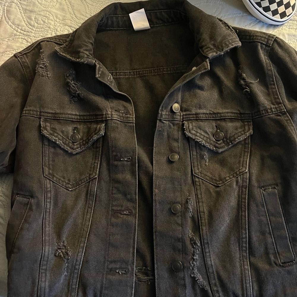 Distressed black denim jacket